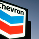 A Chevron gas station service sign.
